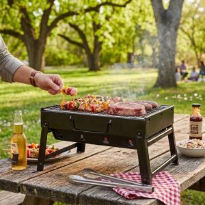 Barbacoa de carbón portátil compacta, 4 patas plegables, diseño maletín - Roamgrill